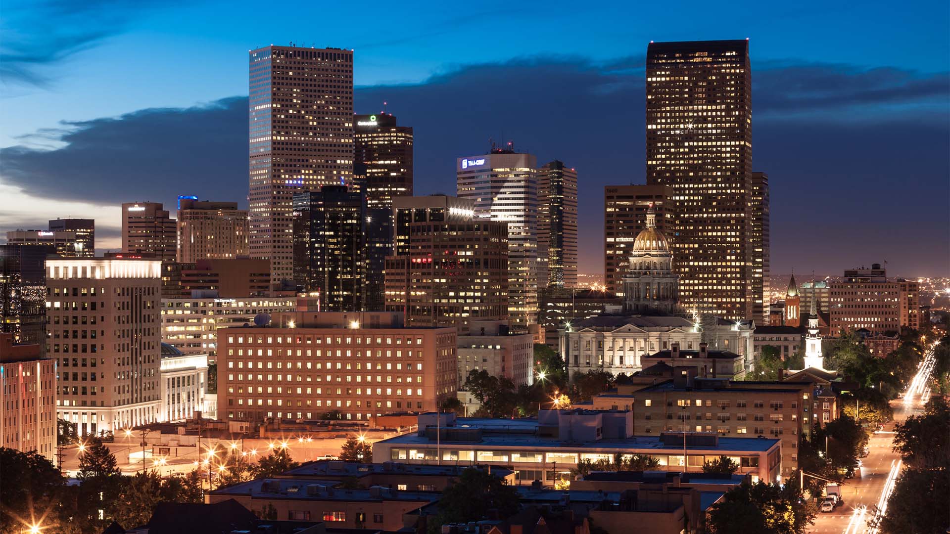 View from 1000 Grant overlooking Denver at dusk.