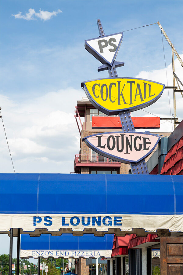 Detail of PS Cocktail Lounge retro neon signage.