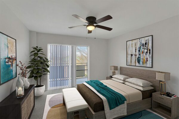 Bedroom with platform bed, bedside tables with lamps, and balcony door.
