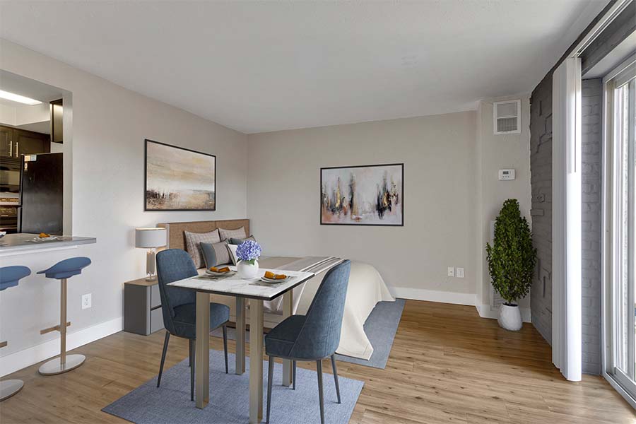 1265 Downing furnished studio apartment living and eating area.