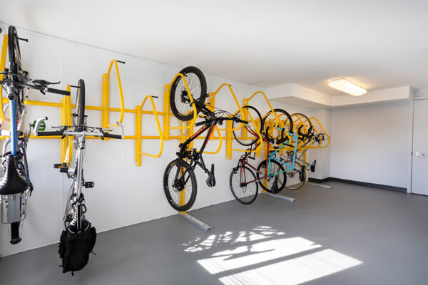 Bike room with storage rack.