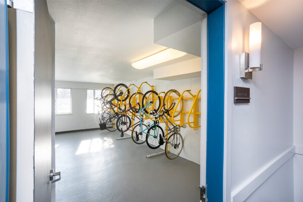 Door to bike room with bike stands.