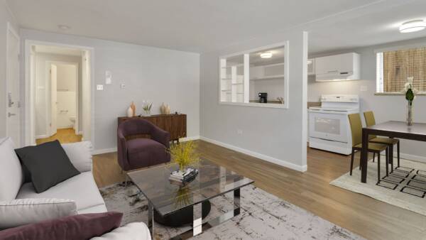 1435 Franklin apartment living room with plush rug and comfortable furniture.