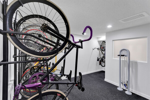Bike storage room with bikes on racks.