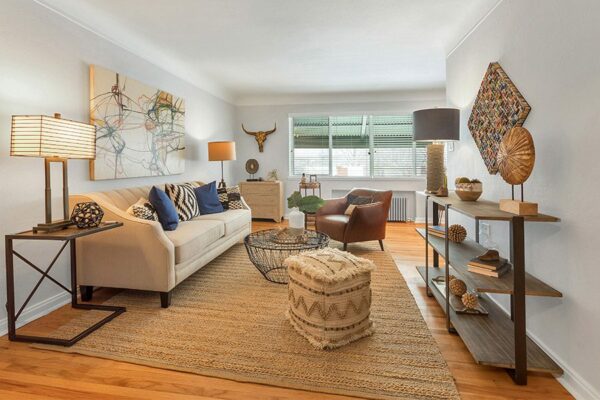 living room with boho decor and large window