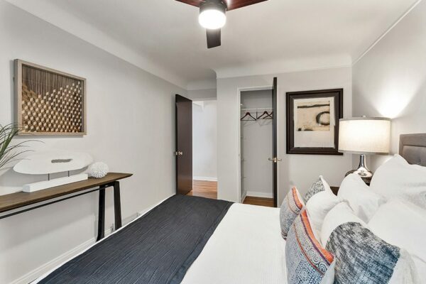 bedroom with natural light, ceiling fan and clean decor