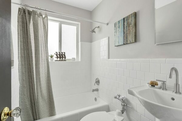 bathroom with bright white decor and clean surfaces