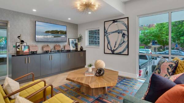 Clubhouse with artwork and a seating area.