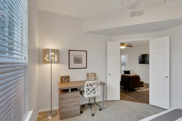 Bedroom with work desk.