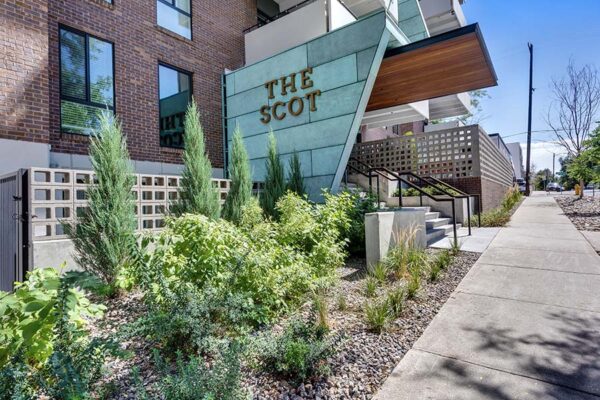 Landscaped post-renovation entrance area at the Scot.