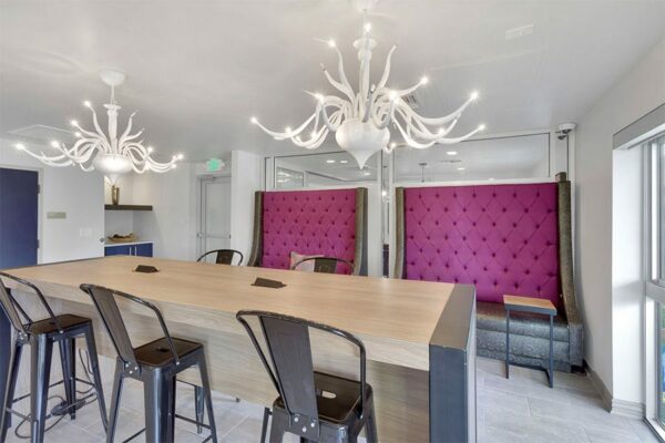 Workspace at 515 Clarkson with a large conference table.