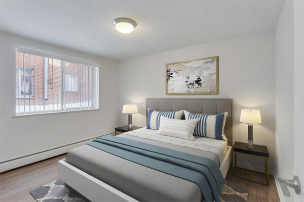 Image of furnished bedroom with window and made bed in 870 Cherry