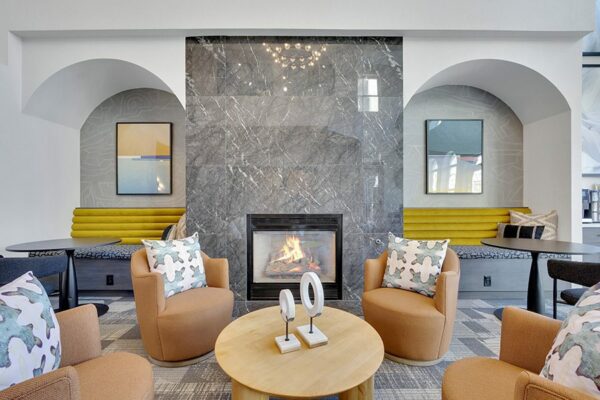 Resident lounge with couches and chair.