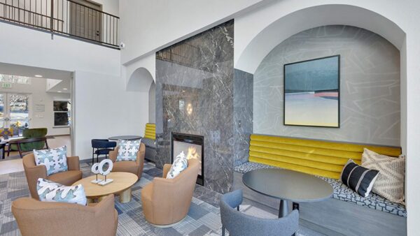 Resident lounge with couches and chair.