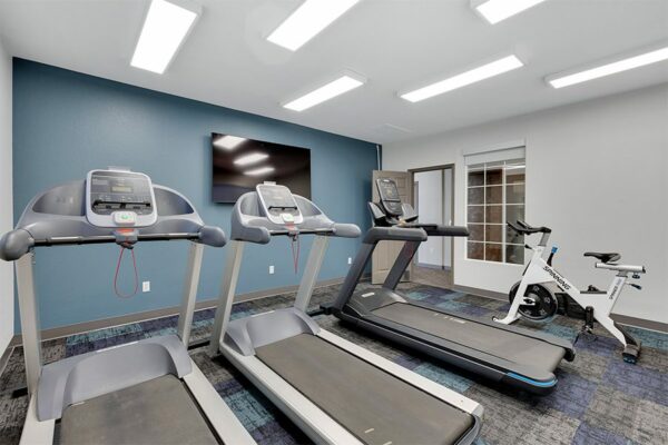Fitness center with treadmills.