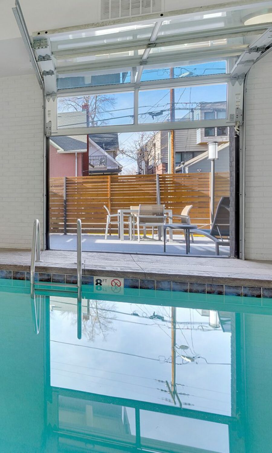 515 Clarkson indoor pool with outdoor lounge area.