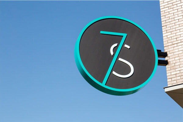 7 S Denver Haus circular monument sign.