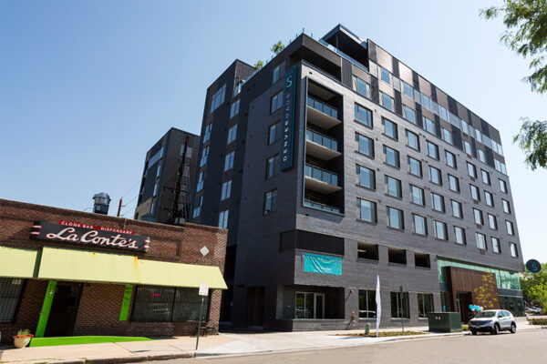 7 S Denver Haus building exterior with modern architecture and apartment balconies.