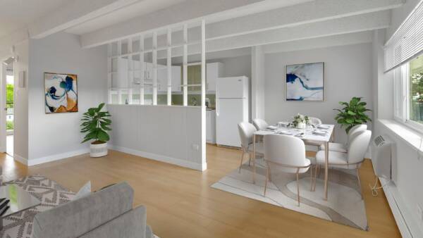 Living area with dining room, kitchen, and living room with modern furniture and bright window.