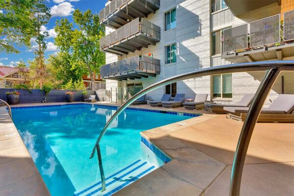 950 Lafayette pool area, stairs and handrail leading into the pool.