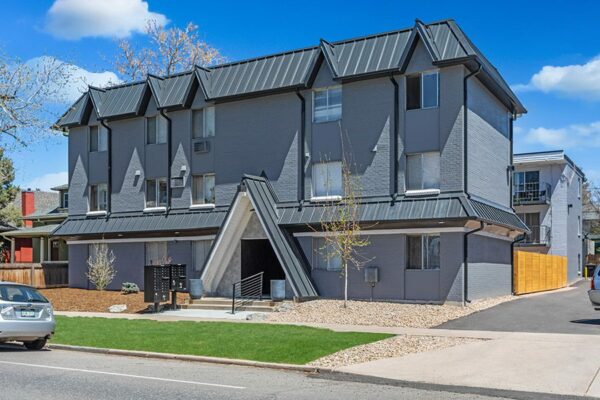 960 Logan exterior with grey brick construction and A-frame elements.