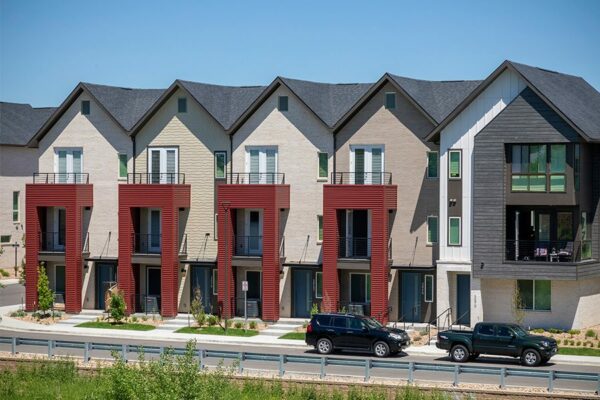 Dayton Station townhomes with ample street parking and nearby open space.