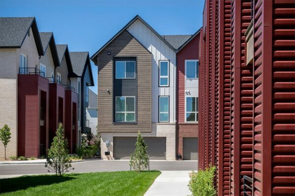 Dayton Station townhomes with lush green lawns and newly planted trees.