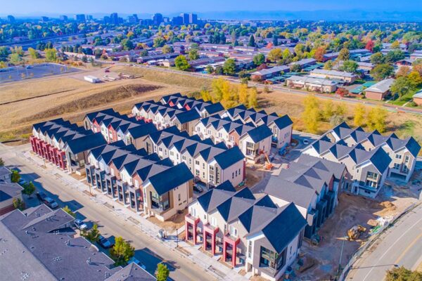 Aerial view of Dayton Station townhomes with 3 story construction and ample street parking.