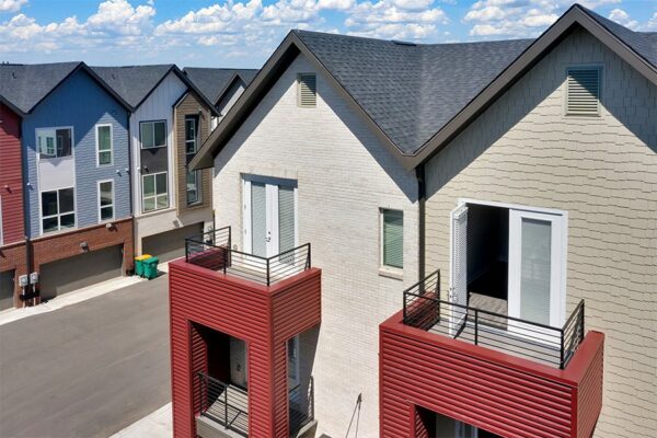 Aerial view of Dayton Station townhomes with three story construction and garages.