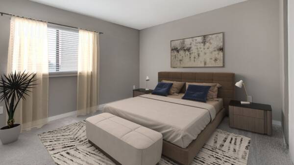 Bedroom with carpet, bed with plush headboard, modern beside tables with lamps, and large window.