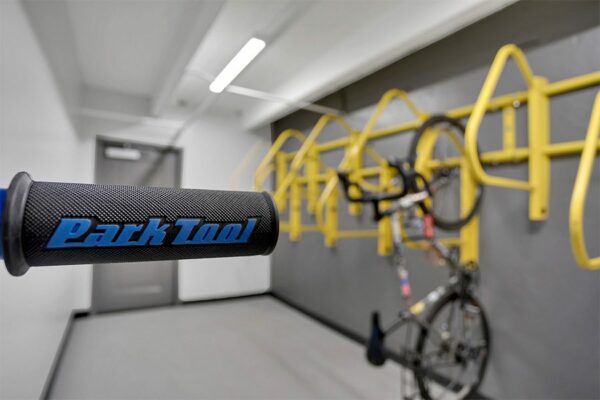 Detail of bike repair rack with graphic reading 