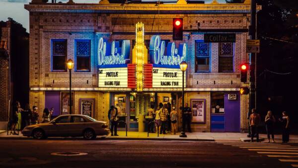 Bluebird Theater on Colfax with bright neon marquee signage.