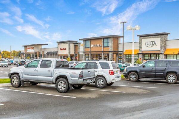 Shopping center with parked cars and Ulta, Sierra Trading, and Home Goods storefronts.