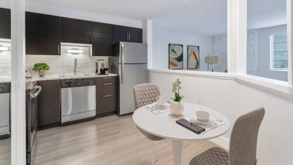 kitchen with dining seat and stainless steel appliances