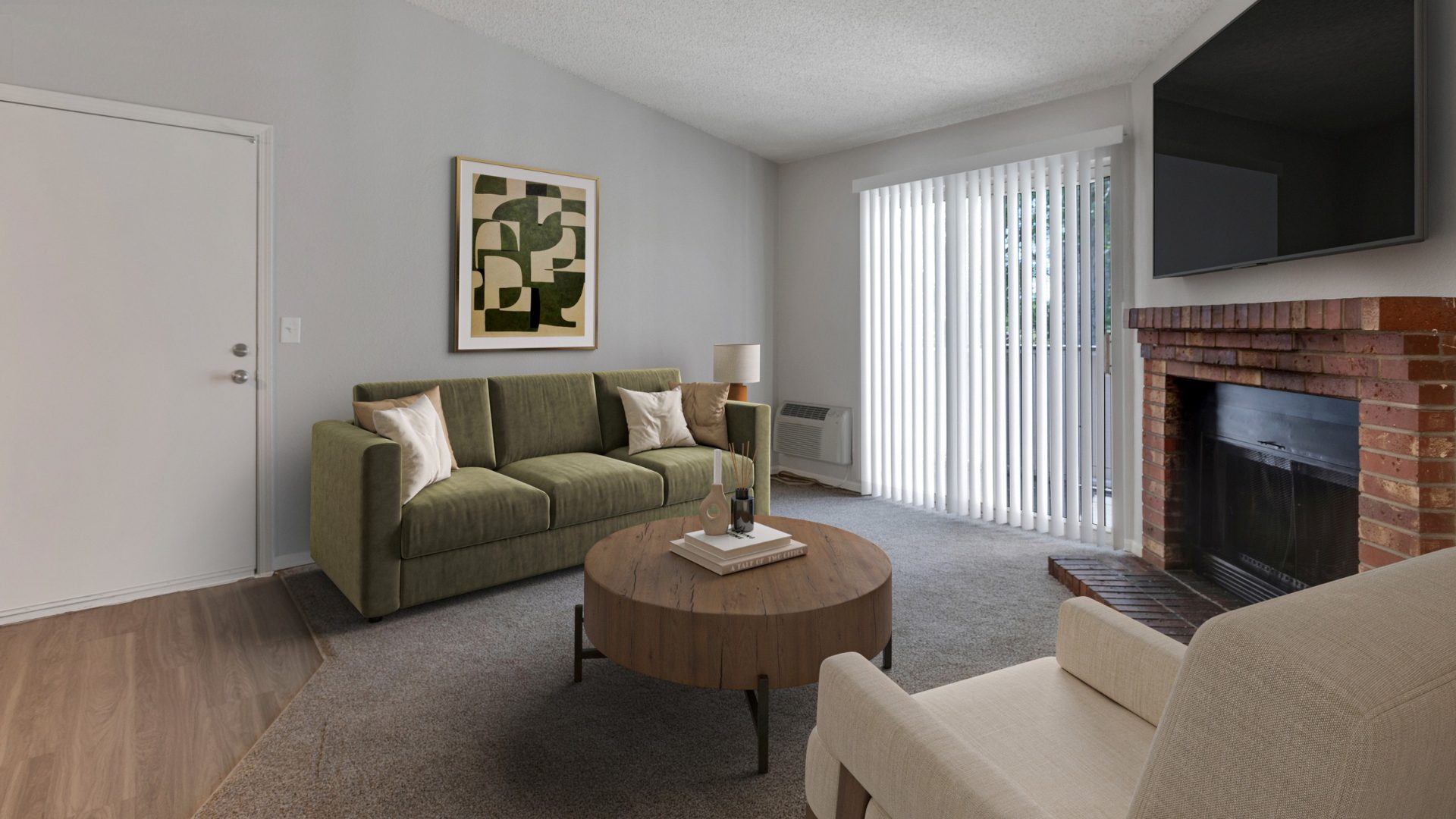 living room with fireplace, couched, coffee table, and window to balcony