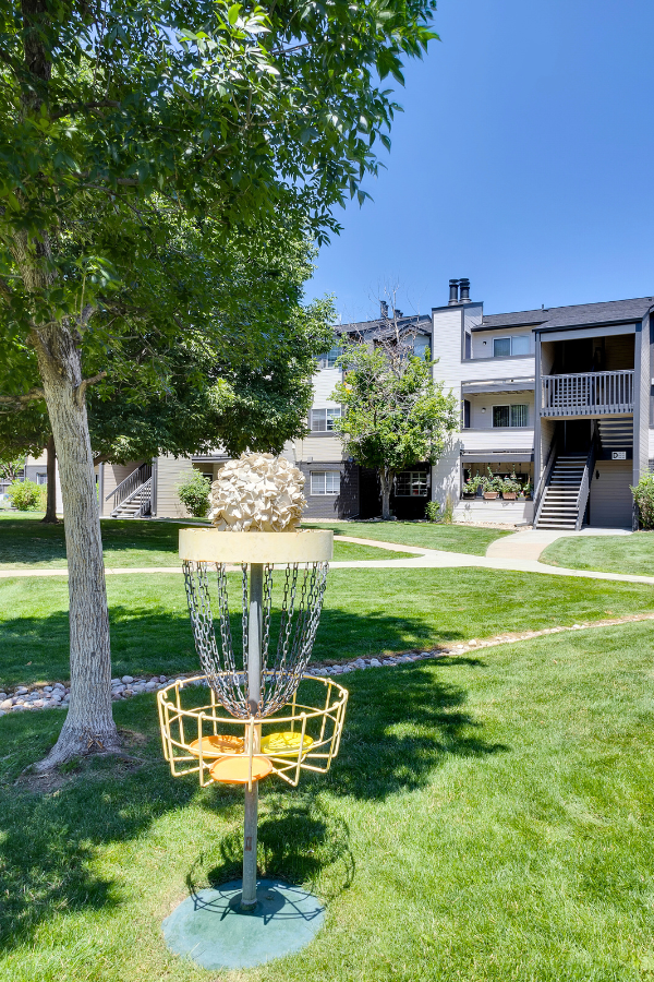 frisbee golf hole outside of the apartment building