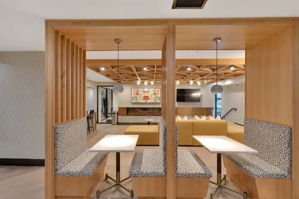 Community area with seating and a TV.