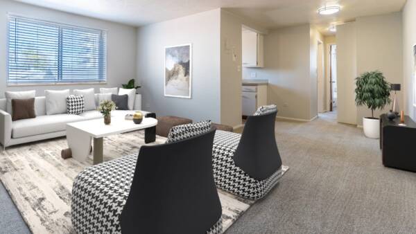 living room with couches face each other and view down hallway to kitchen and bedroom