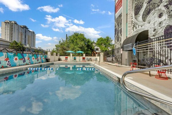 180 Flats outdoor pool with lounge chairs.