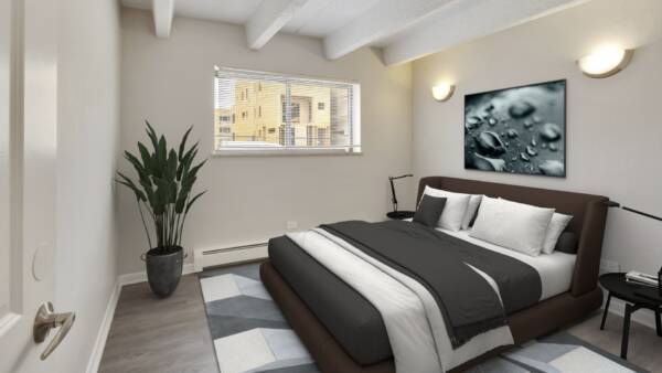 one bedroom apartment with king size bed, night stands and large window