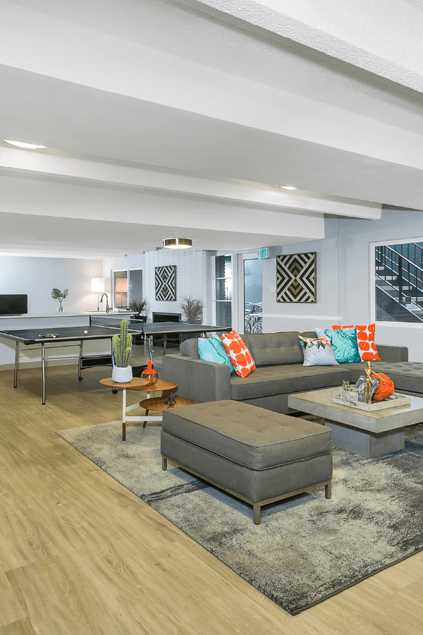 resident lounge with couch and ping pong table