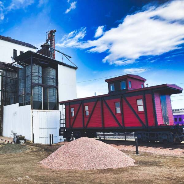 A train and farm in Thornton, Colorado.
