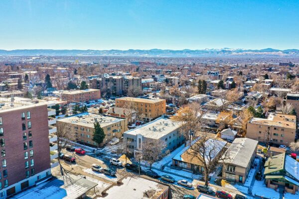 Aerial view over 25 Emerson apartments looking west towards the mountains.
