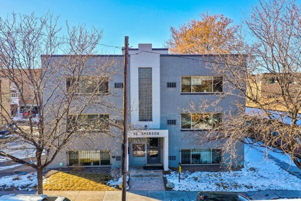 Aerial view of 25 Emerson with grey brick construction and classic mid century style.