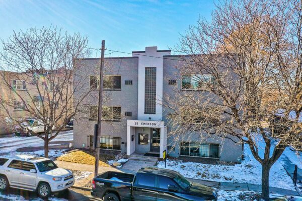 Aerial view of 25 Emerson with grey brick construction and classic mid century style.