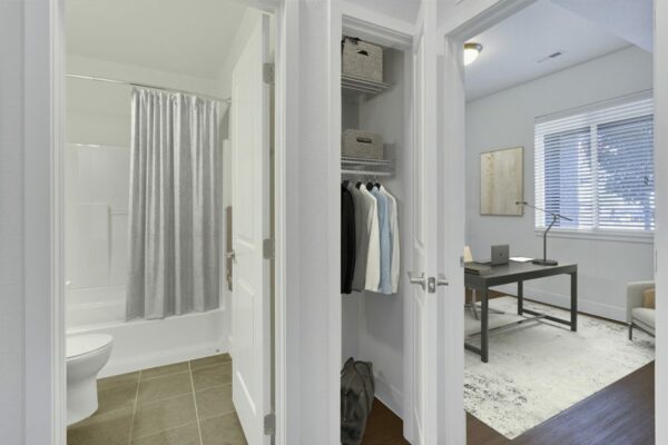 Rendering of an office next to a bathroom with a hallway closet.
