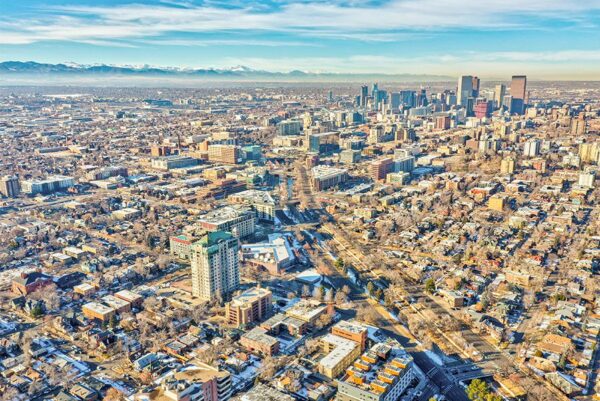 Aerial view of 550 East 3rd Avenue looking northwest towards Denver and the foothills.