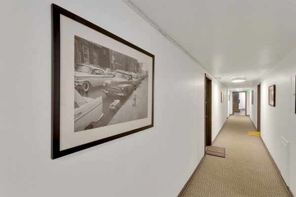 Hallway with framed decor.