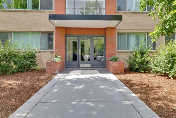 Five50 apartments with brick exterior and lush landscaping.