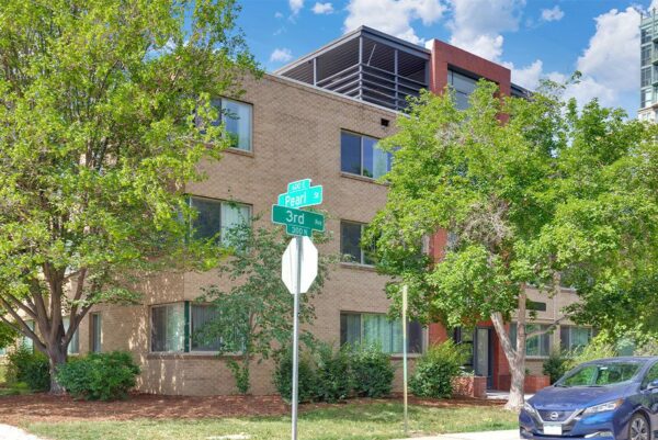 Five50 apartments with brick exterior and lush landscaping.